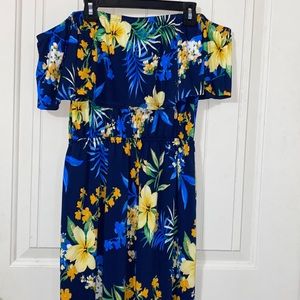 This maxi dress is a small, dark blue with tropical print made from My Story.